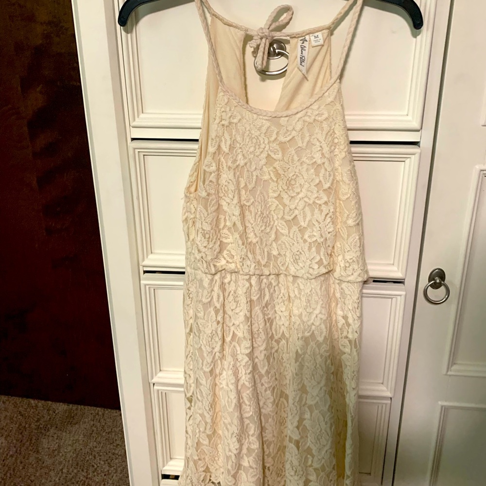 Beautiful lace cream women’s summer dress with cinched waist